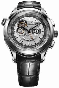 Zenith Automatic COSC Silver Guilloche With Large Double Date Window At 2, Power Reserve Indicator At 6, Seconds Sub- And Partial Skeleton View Of Movement Escapement Between 9 And 12. World Time Function Indicates Timezones For 24 Different Cities On Out